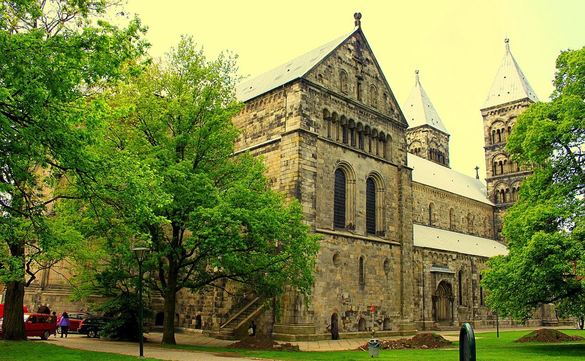 Lund Cathedral among green trees