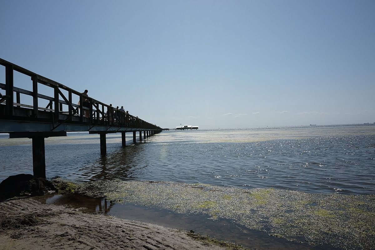 Långa Bryggan pier stretching out over the sea in Bjärred